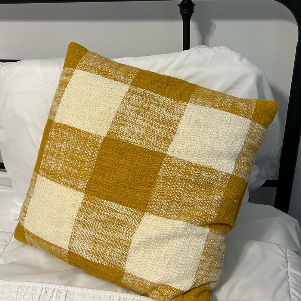 Yellow buffalo check pillows.